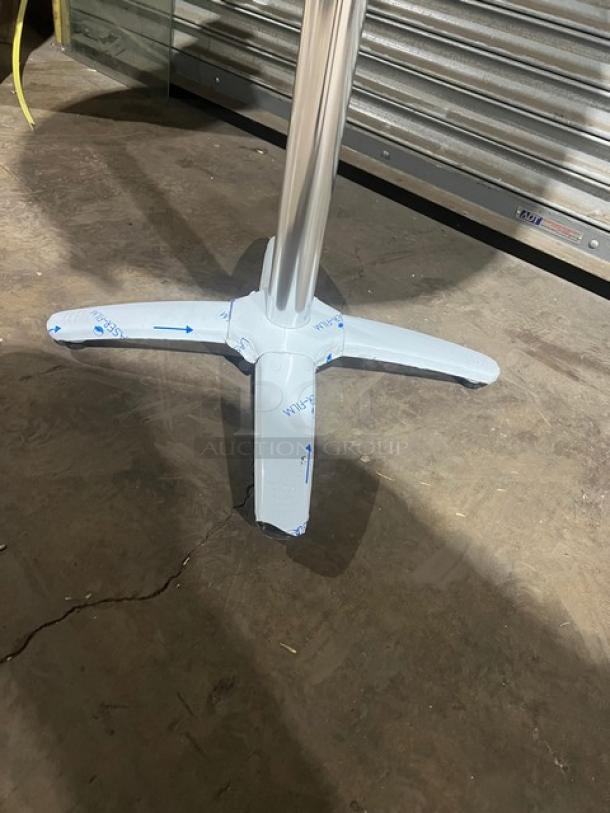 Brand new DuroWood 36" round dining table with 4-way pedestal base, model DW-36.