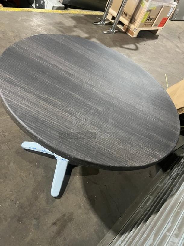 Brand new DuroWood 36" round dining table, Model DW-36, with a 4-way pedestal base, modern design.