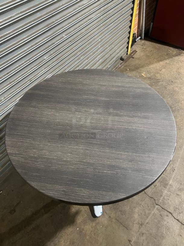 Brand new DuroWood 36" round dining table, model DW36, with a 4-way pedestal base. Durable, modern design.