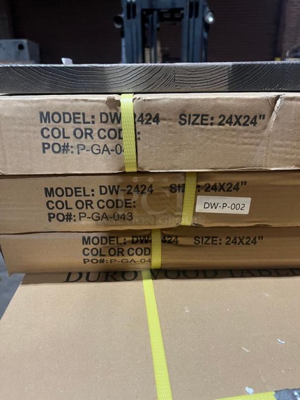 Brand new 24"x24" DuroWood DW-2424 barn wood dining table in box. Features 4-way pedestal base. Model and size markings visible.