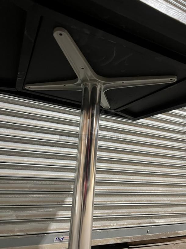 Brand new DuroWood DW2430 dining table base, chrome 4-way pedestal style, supporting a 24"x30" rectangular top.