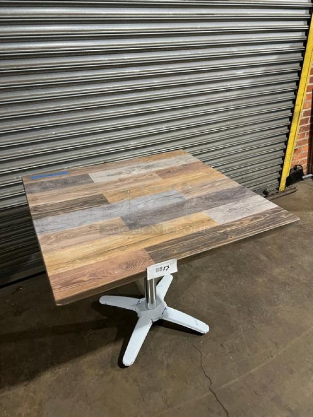 Brand new 36"x36" barn wood plank dining table, model DW3636, with durable 4-way pedestal base. Ideal for commercial use.