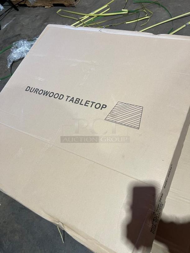 Brand new DuroWood DW3636 rustic dining table in box. Features barn wood plank top, 36"x36", 4-way pedestal base.