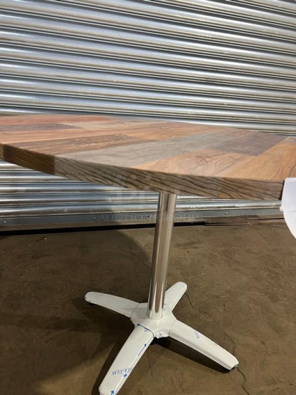 Brand new barn wood plank DuroWood round dining table with a 4-way pedestal base, rustic design, commercial-grade.