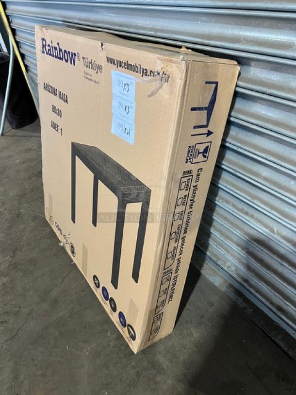 Brand new Rainbow Arizona commercial brown polypropylene faux wood square outdoor table, rattan finish, boxed.