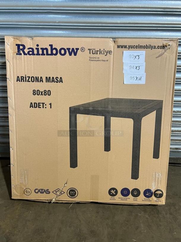 Brand new Rainbow Arizona 80"x80" square outdoor table, brown polypropylene, faux wood slats, rattan texture, legged design.