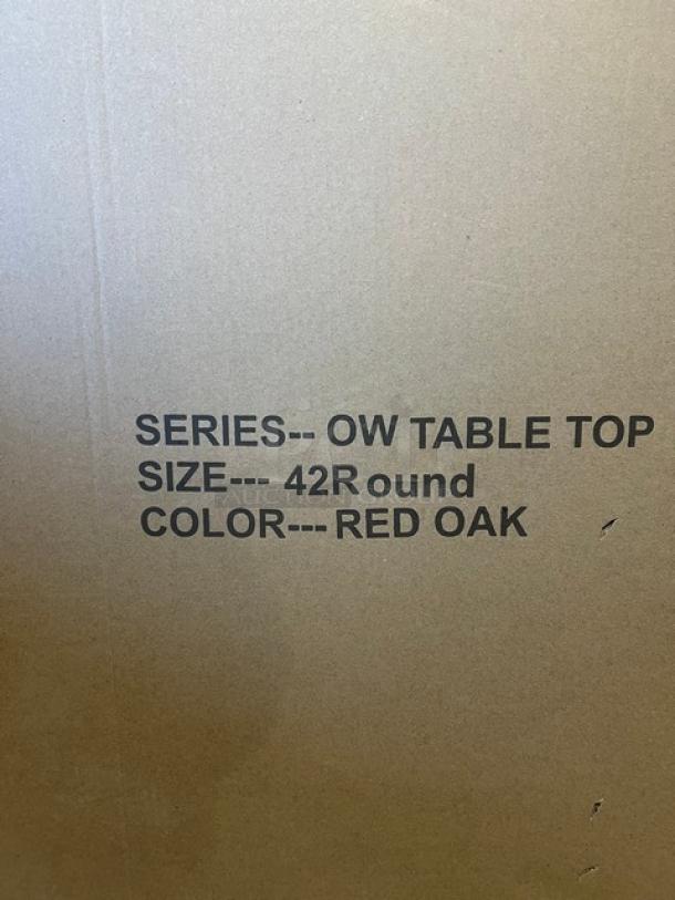 Brand new 42" round commercial dining table in textured red oak with regular height base. Series: OW Table Top.
