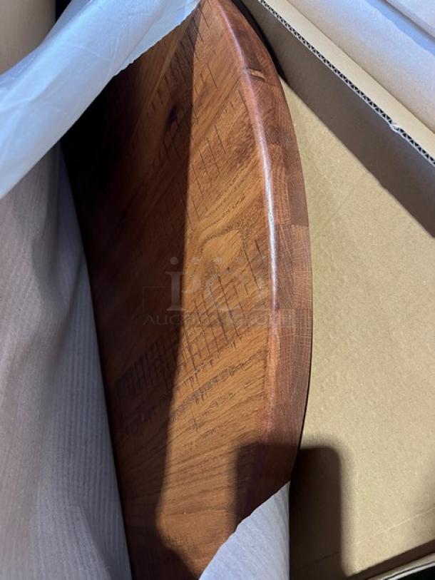 Brand new 36" round red oak dining table top, textured finish, in packaging, with regular height base included.