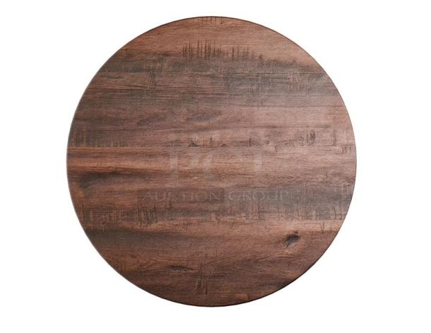 Brand new 36" round red oak dining table with textured finish and regular height base; ideal for commercial use.