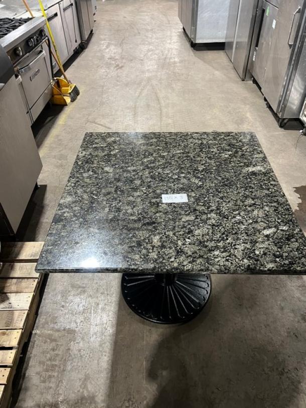 Brand new Art Marble Furniture 36"x36" Ubatuba granite table, model G203, with semi-gloss cast iron base.