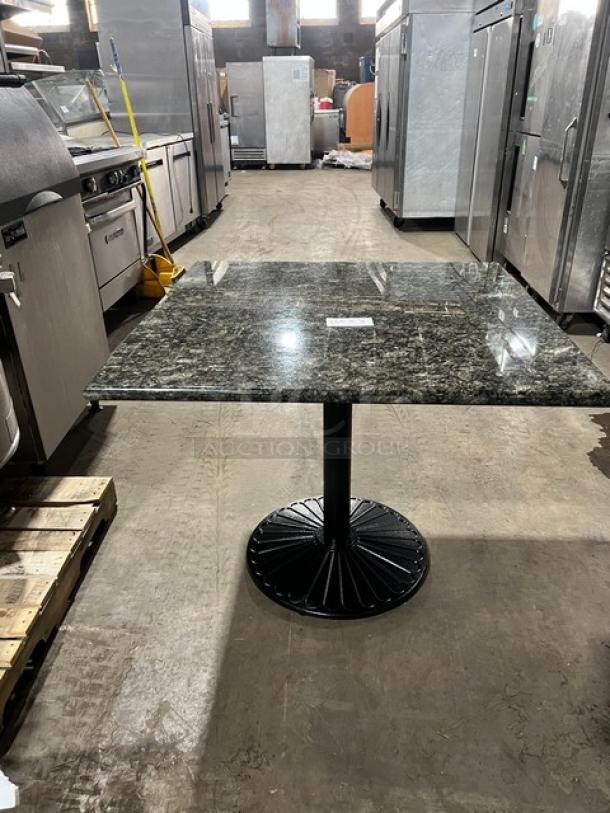 Brand new 36"x36" Art Marble Furniture Ubatuba Granite dining table, model G203, with semi-gloss cast iron base.