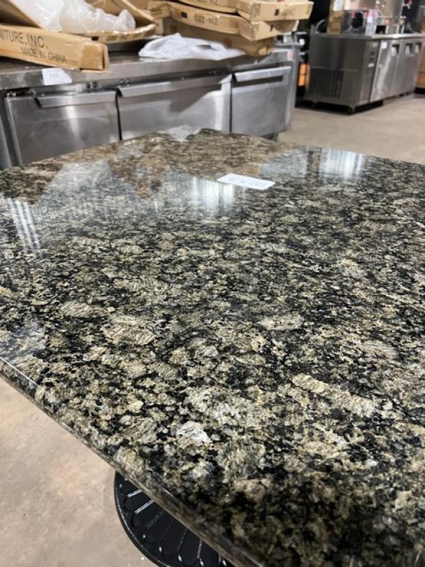 Brand new Art Marble Furniture Ubatuba granite dining table, 36"x36", with semi-gloss cast iron base, Model G203.