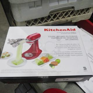 Kitchenaid Vegetable Sheet Cutter Mixer Attachment, new in box, features sheet-cutting for vegetables. Model shown on packaging.