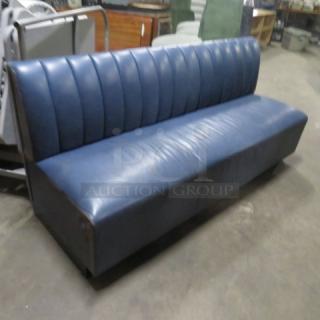 Single-sided blue cushioned booth, 75x26x34 inches, in fair condition.