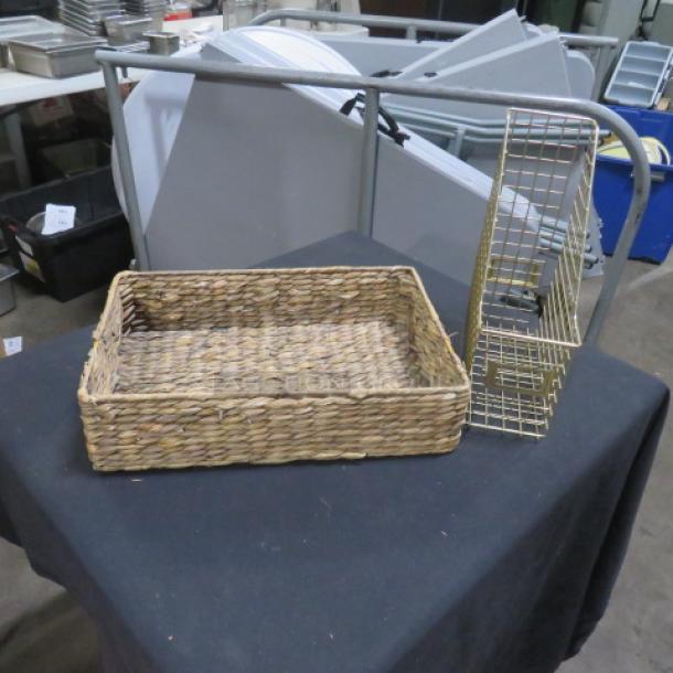 Woven basket and metal rack on black tablecloth in industrial setting; used condition.