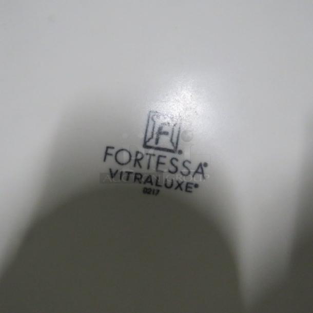 Fortessa Vitraluxe dinner plate, 11-inch, white, logo and "0217" marking visible, in excellent condition.