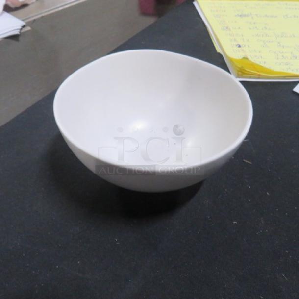 Fortessa 9.5-inch white bowl, smooth finish, excellent condition, minimal wear, no visible markings.
