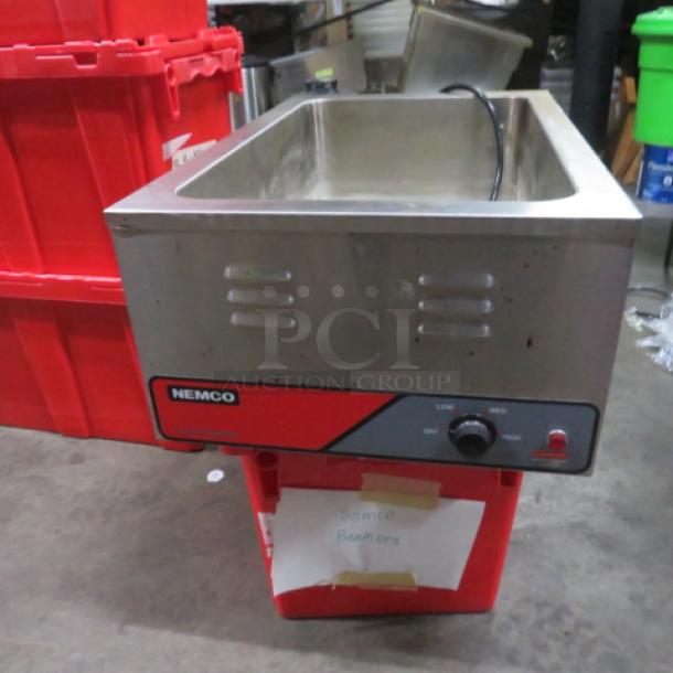 Nemco Food Warmer Model 6055A, 1200 Watt, 120 Volt, stainless steel, temperature dial, good condition.