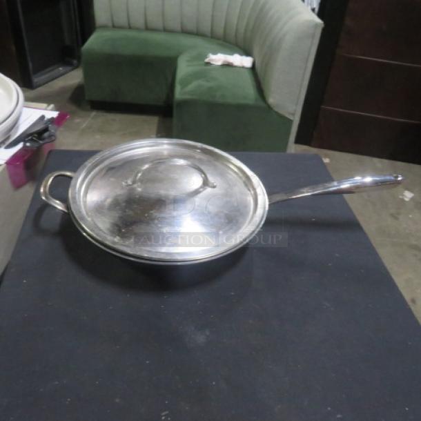 Williams Sonoma 12-inch stainless steel Thermo Clad fry pan with lid. Excellent condition.