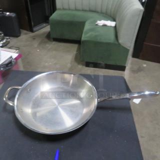 Williams Sonoma 12-inch stainless steel Thermo Clad fry pan, polished finish, used condition.