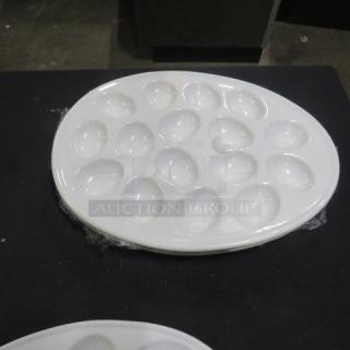 Oval egg platter, 14x11 inches, white ceramic, 15 egg slots, excellent condition.