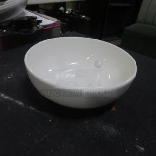 White 6-inch bowl in good condition, smooth finish, with no visible markings or labels, item number 14XBID.