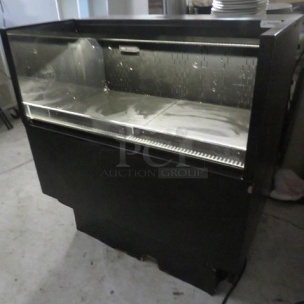 One WORKING Structural Concepts C03324R undercounter refrigerated air cooler, 120V, 36x24x39.5 inches, open front.