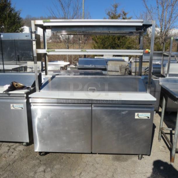 Avantco 2-door refrigerated prep table with cutting board, stainless steel overshelves, 48-inch ticket rail, ServIt food warmer, on casters. Model 178SSPT60-HC.