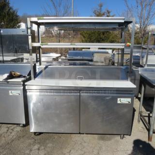 Avantco 2-door refrigerated prep table with cutting board, stainless steel overshelves, 48-inch ticket rail, ServIt food warmer, on casters. Model 178SSPT60-HC.