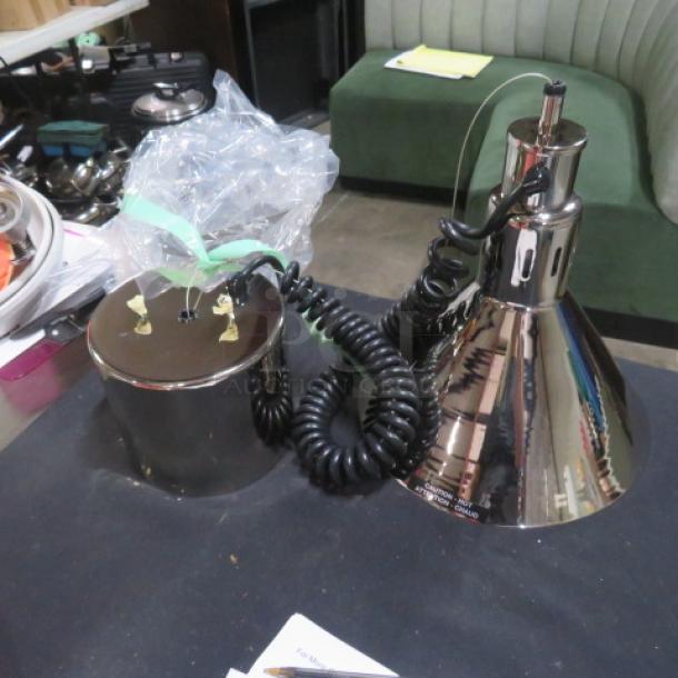 Hatco stainless steel food warmer lamp, model DL-775-RL, with retractable cord. New condition, $569.80 value.