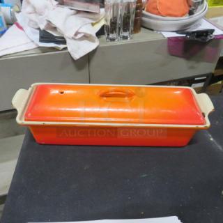 Le Creuset 2 qt orange cast iron terrine baker with lid, excellent condition, $225.00.