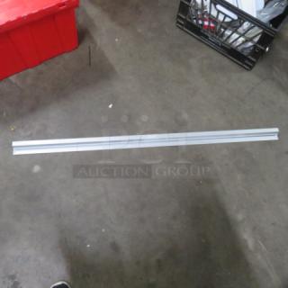 48-inch silver ticket rail, new condition, suitable for organizational use in offices or retail spaces.