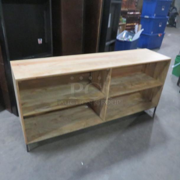 Wooden shelving unit with metal frame, 64x16x29 inches, featuring 4 shelves. Natural finish, suitable for storage and display.