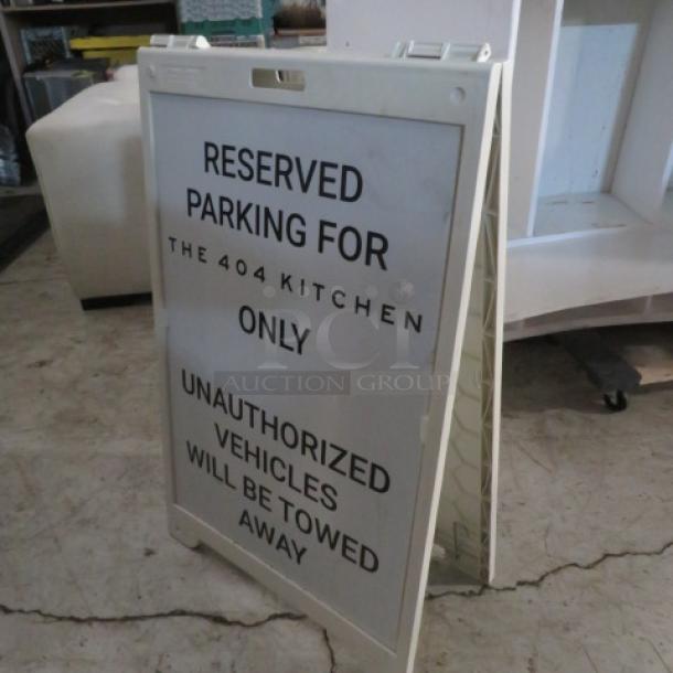 Signcade Sidewalk Sign, 26.5x42 inches. "Reserved Parking for The 404 Kitchen." Durable, good condition, folding design.