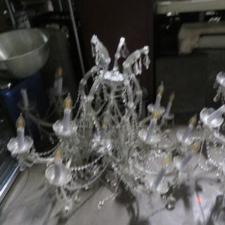 Elegant 16-light crystal chandelier, intricately designed with hanging crystal beads; good condition, ideal for grand settings.