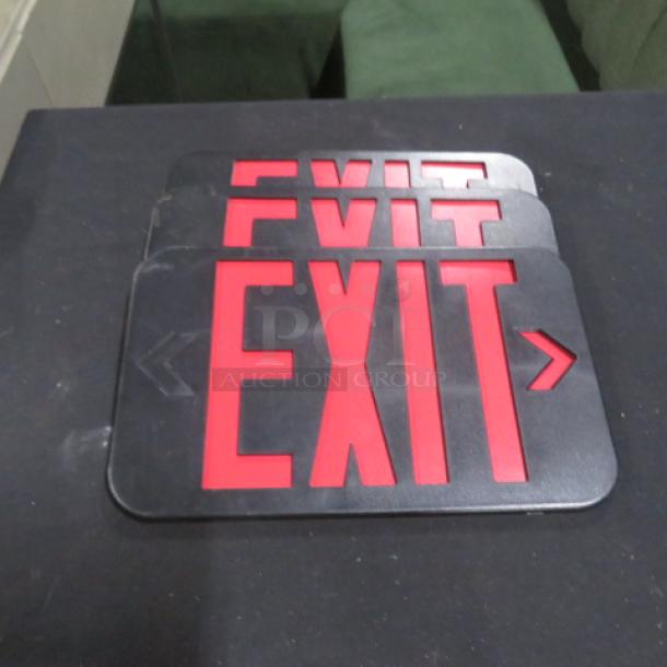 New Exit Light Cover, red lettering on black, model 3XBID, stack of three, unused condition.