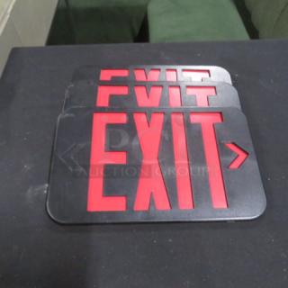 New Exit Light Cover, red lettering on black, model 3XBID, stack of three, unused condition.