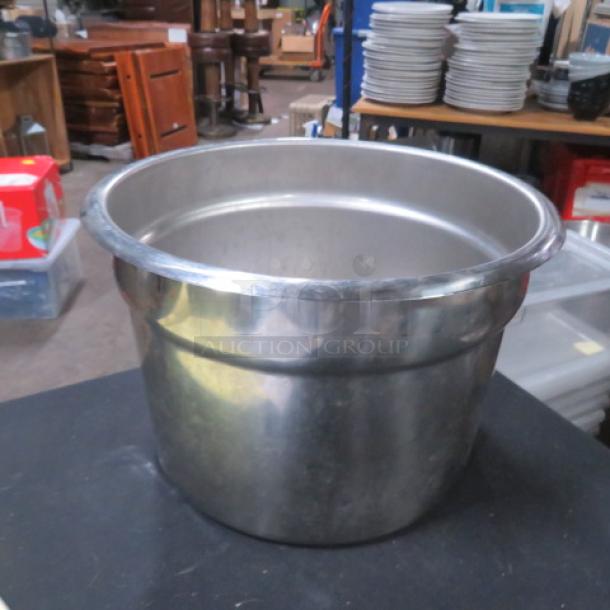 Stainless steel Bain Marie, 12x8 inches, used condition, smooth surface, ideal for food storage and serving.