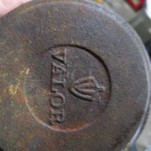 Valor Cast Iron Pot, marked with Valor logo. Moderate rust patina, vintage condition. Dimensions 4X2. Model 7XBID.
