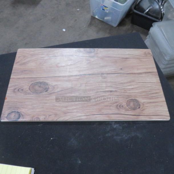 Melamine serve board with wood grain design, 14.5x8.5 inches, in excellent condition.