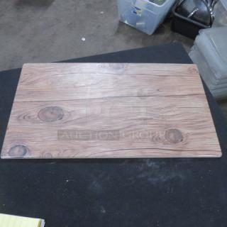 Melamine serve board with wood grain design, 14.5x8.5 inches, in excellent condition.