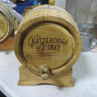 Chattanooga Whiskey wooden barrel on stand, branded text, spout; used condition, decorative and functional.