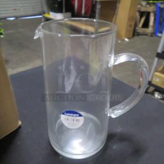 NEW Luminarc 43-3/4oz glass pitcher with handle, clear design. Features a Luminarc label. Ideal for serving beverages.