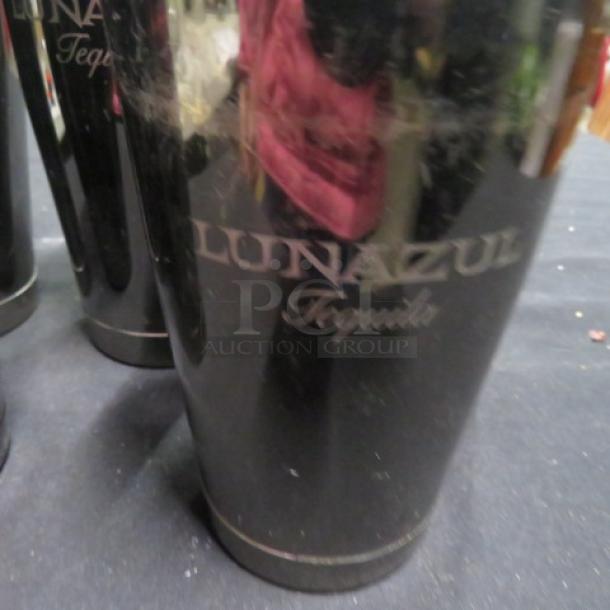 Assorted stainless steel mixing glass with "Lunazul Tequila" branding. Polished finish, good condition.