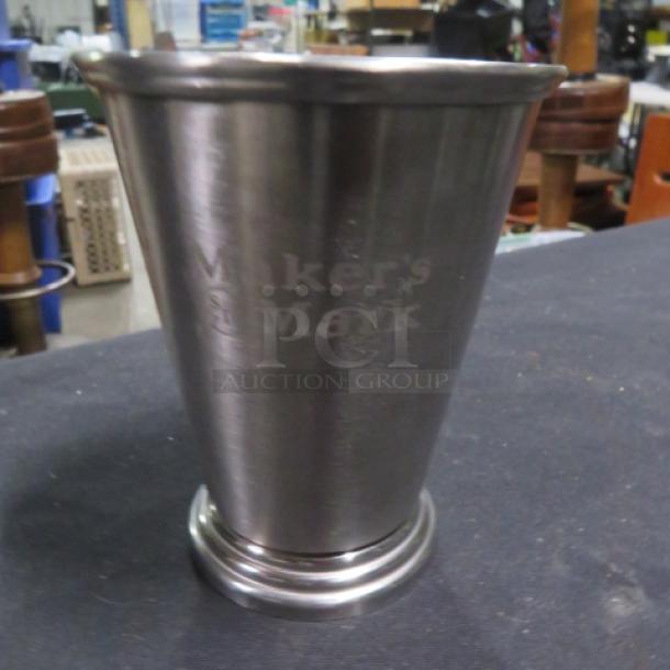 Makers Mark stainless steel mule cup, engraved logo, gently used condition, conical shape, ideal for cocktails.