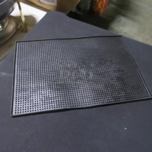 Black Bar Mat 3XBID, rectangular rubber with textured surface. Used for spill management. Appears in good condition.