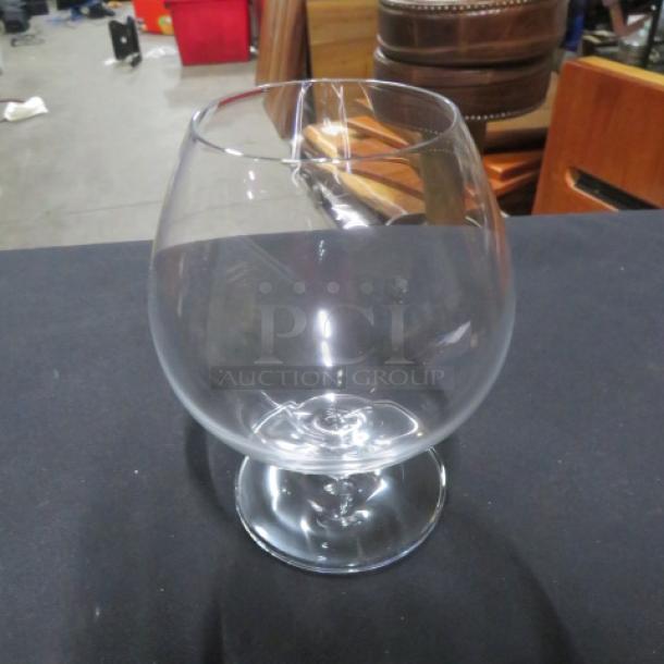 NEW Stolzle Brandy Glass, model 6XBID, pristine condition, clear glass, rounded bowl, sturdy base.