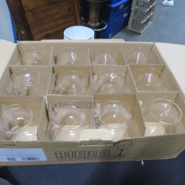 Box of 12 new Riedel BIG Pinot Noir crystal stemless wine glasses, clear, pristine condition, with original packaging.