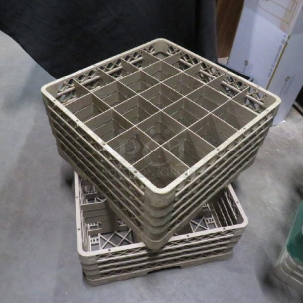 Assorted dishwasher rack stack, beige, used condition, featuring multiple compartments for organized dish placement.