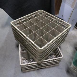Assorted dishwasher rack stack, beige, used condition, featuring multiple compartments for organized dish placement.